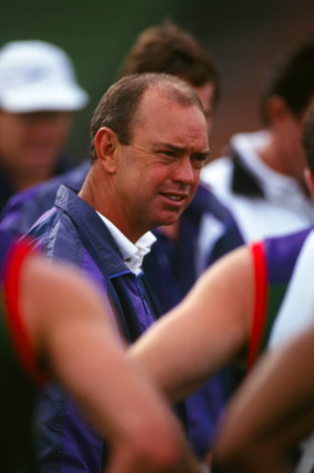 Gerard Neesham addresses his players during the break at a 1995 Ansett Cup, pre-season match.
