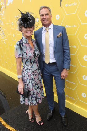 Julie Bishop and her partner David Panton in the Bumble marquee.