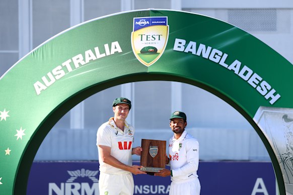 Pat Cummins and Najmul Hossain Shanto share the spoils after the two-Test series between Australia and Bangladesh was drawn 1-1.