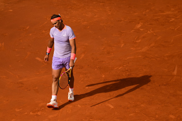 Rafa Nadal shows his dejection after missing a point against Alex de Minaur during their match.