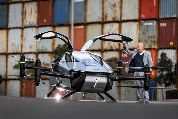 The XPeng flying car and Ray Evans, who is putting on the EV Car Show in Melbourne. 