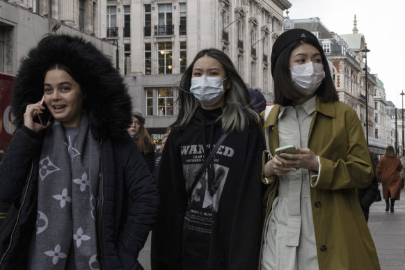 People on Oxford Street, London, England, where free universal testing has ended despite soaring COVID rates. 