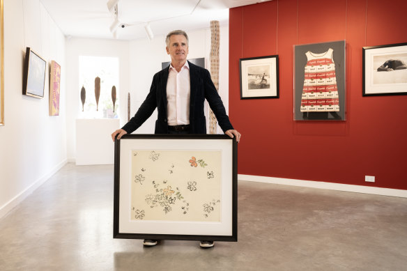 Paddington gallerist Justin Miller, with works which include Andy Warhol (pictured) ready to be moved from the gallery to the Sydney Contemporary art fair.