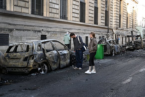 A charred car near Place de la Republique the day after protests.