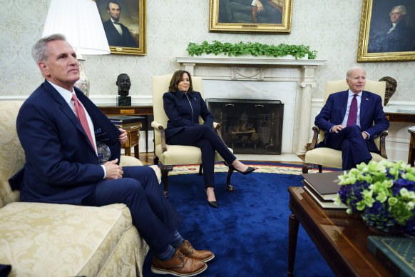 US Speaker of the House Kevin McCarthy (left) and Vice President Kamala Harris with President Joe Biden during a debt ceiling meeting in the Oval Office on May 16.