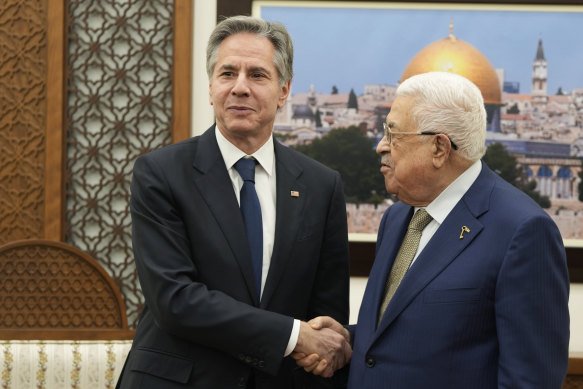 US Secretary of State Anthony Blinken (left) and Palestinian President Mahmoud Abbas shake hands during their meeting in the West Bank city of Ramallah on Wednesday.