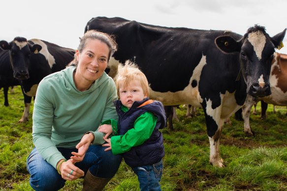 Amy Cosby on her dairy farm with her one-year-old son, Xavier.