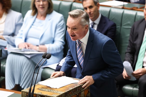 Minister for Climate Change and Energy Chris Bowen lets fly during question time at Parliament House.