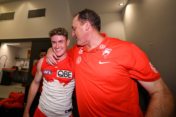Chad Warner celebrates a crucial Sydney win and a career-best performance with coach John Longmire.