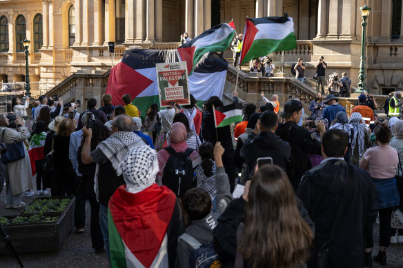 People gather at Sydney’s Town Hall for to rally for a free Palestine.
