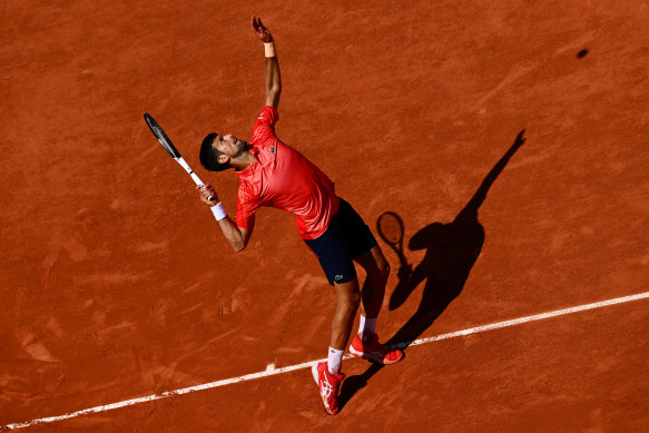 Novak Djokovic serves to Aleksandar Kovacevic on day two of the French Open.