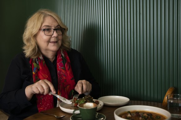 Jennifer Burn talks over lunch at Lunas.