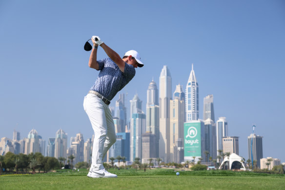 Rory McIlroy tees off on the eighth during his final round in Dubai.