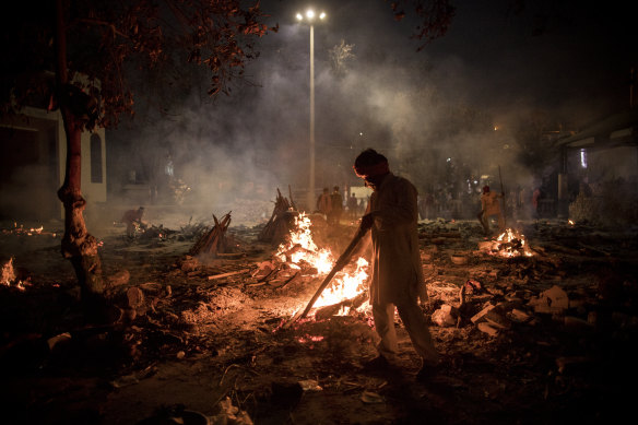 A crematorium in Delhi on Thursday where multiple funeral pyres were burning for victims of COVID-19.