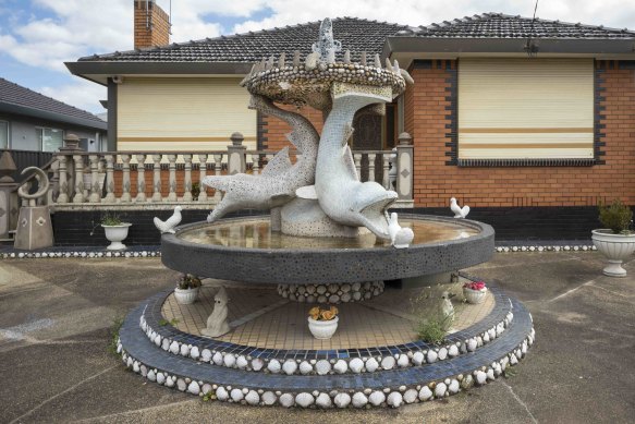 A life-size dolphin fountain in Reservoir.