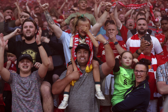 Fans celebrate Liverpool’s win in the English FA Cup.