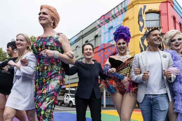 Lord Mayor Clover Moore with Roads Minister Natalie Ward, Sydney MP Alex Greenwich and Sydney drag queens on Thursday.