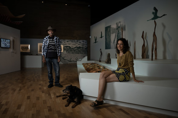 Curators Uncle Badger Bates and Justine Muller, with Denzal the dog.
