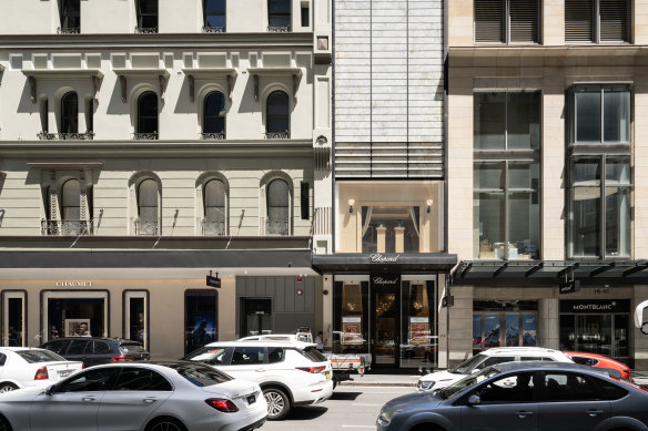 This building at 119 King Street, Sydney, (centre) has been seized by the AFP.