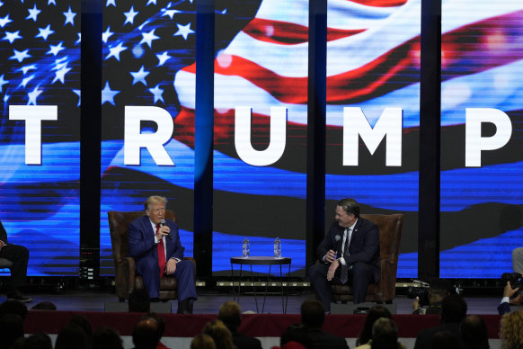 Donald Trump and Georgia Lieutenant Governor Burt Jones at a faith meeting at a church in Zebulon, Georgia, on Wednesday.