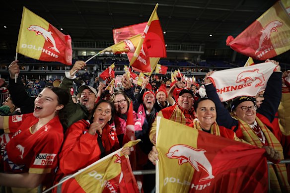 Dolphins fans celebrate their first finals win on Saturday.