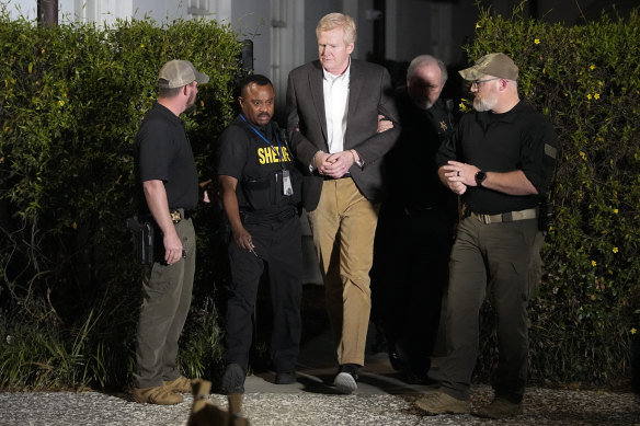 Alex Murdaugh , center, is led out of Colleton County Courthouse by sheriff’s deputies after being convicted.