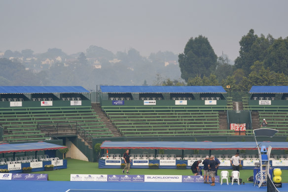 Kooyong Lawn Tennis Club in a smoke haze on Tuesday morning.