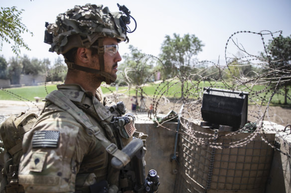 A US Army paratrooper of the 82nd Airborne Division stationed at Hamid Karzai International Airport in Kabul.