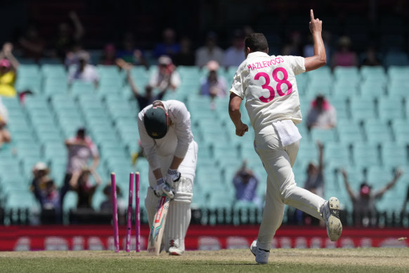 Josh Hazlewood celebrates dismissing Simon Harmer.