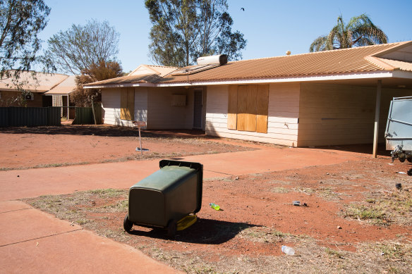 Boarded up homes outnumber occupied properties in some areas of Newman, where BHP owns many of the houses. 