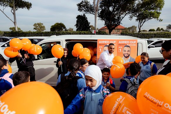 Independent candidate for Blaxland Ahmed Ouf campaigns outside Blaxcell Street Public School in Granville.