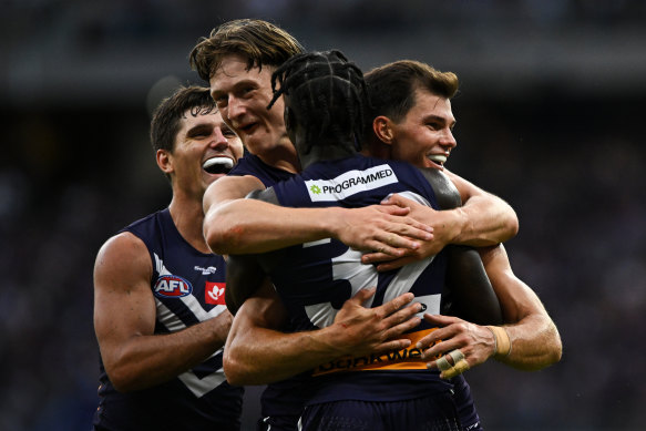 Dockers celebrate after the derby win.