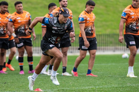 Jarome Luai trains with his Tigers teammates on Thursday.