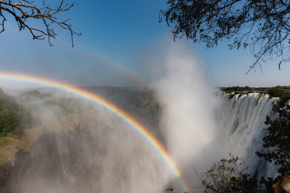 Victoria Falls ... “deafening roar, soaking spray and perfect rainbows”.