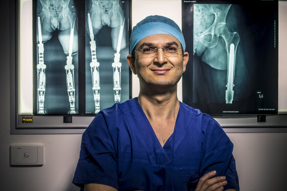 Dr Munjed Al Muderis, pictured in 2014, is suing for defamation.