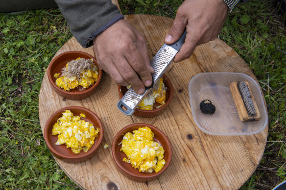 Alessandro prepares a simple dish of eggs with freshly-shaved truffles.