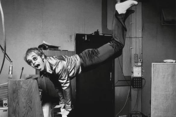 Elton John Singing at Dodger Stadium by Terry O'Neill