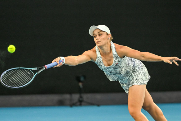 Ash Barty stretches for the ball.