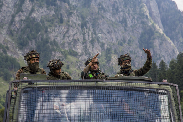 An Indian army convoy carrying reinforcement and supplies heads towards the border with China on Thursday.