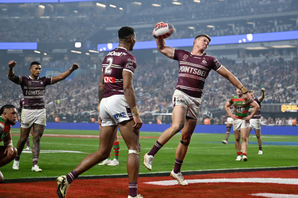 Reuben Garrick spikes the ball after a try.