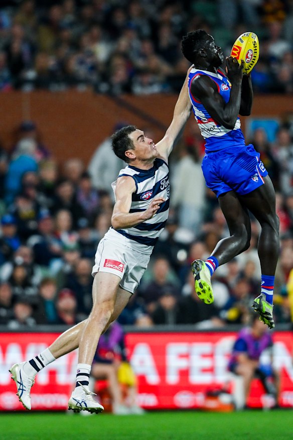Buku Khamis in action for the Bulldogs against Jeremy Cameron’s Geelong in Gather Round.