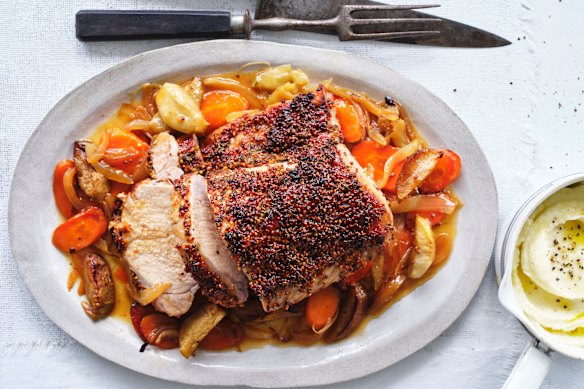Serve the pork on a bed of the roasted apple, onion and carrot.