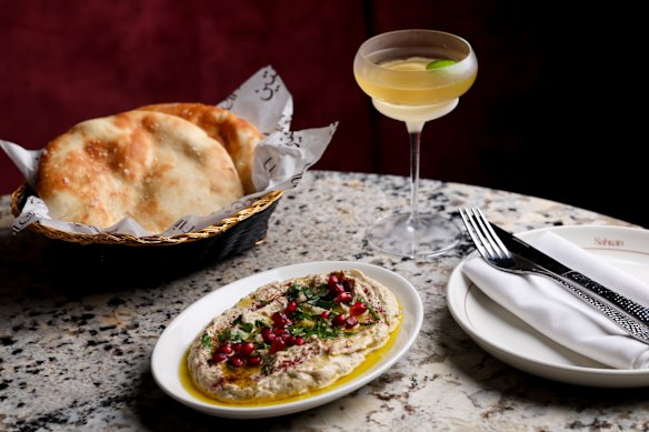 House-baked pita bread with sigh-worthy roasted eggplant dip.