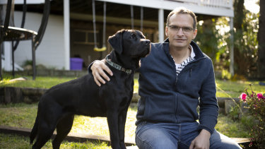 Paul Murgatroyd, of Allambie Heights, with his labrador Lani, decided to partake in the short stay-no gap study and only stayed one night in hospital following a hip replacement operation.