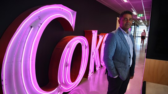 Coca-Cola’s Australia boss Orlando Rodriguez in front of part of the old Coca-Cola sign from Williams Street, Kings Cross. 