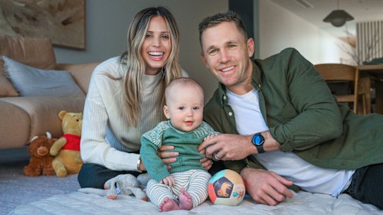 Brit and Joel Selwood with their baby son, Joey.