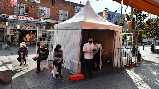 Cabramatta pharmacist Quin On runs two pharmacies, both offering walk-in AstraZeneca vaccine shots. 