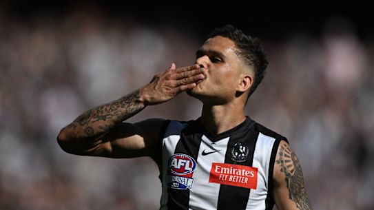 Bobby Hill celebrates a Collingwood goal.