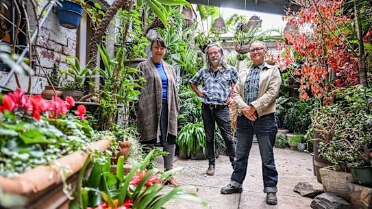 Helen Marcou AM, Quincy McLean AM and Jo Franklin in the courtyard