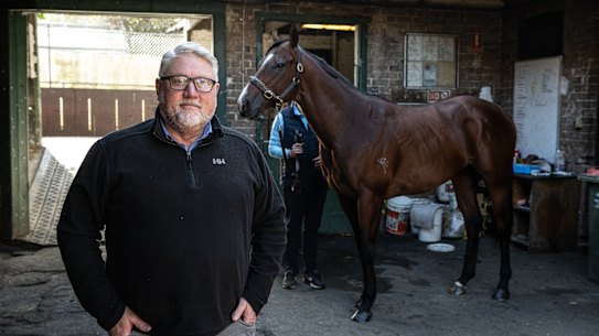 Paul Lumtin, who survived the tragic Sydney to Hobart in 1998, with a horse he part owns, Storm Boy, before The Everest.